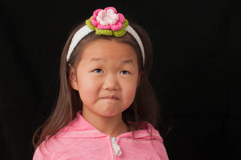 White Crocheted Headband with Pink and Green Flower
