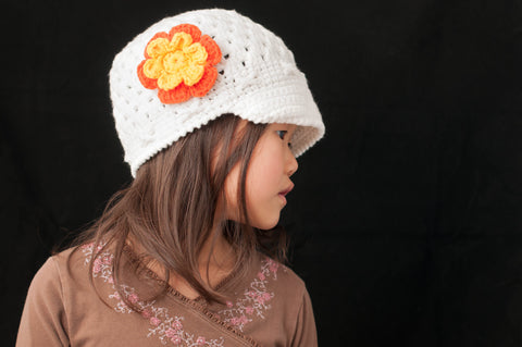 White Crocheted Flower Cap with Orange and Yellow Flower
